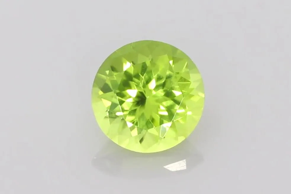 3.45ct round natural peridot (colour green, clarity slightly included, cut faceted) ag & co jewellery
