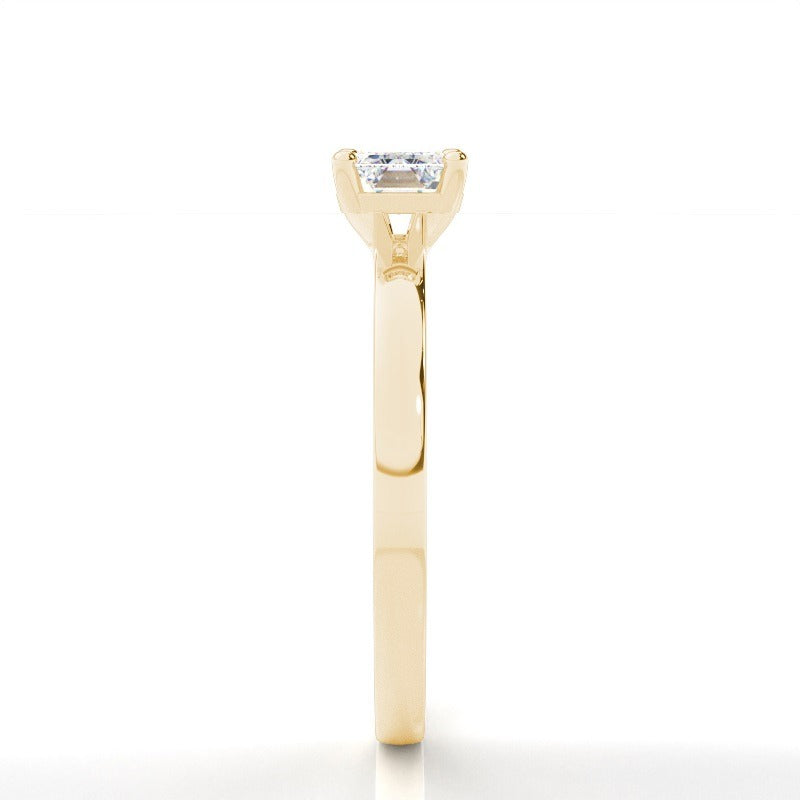 harriet - east west emerald solitaire engagement ring yellow gold ag & co jewellery