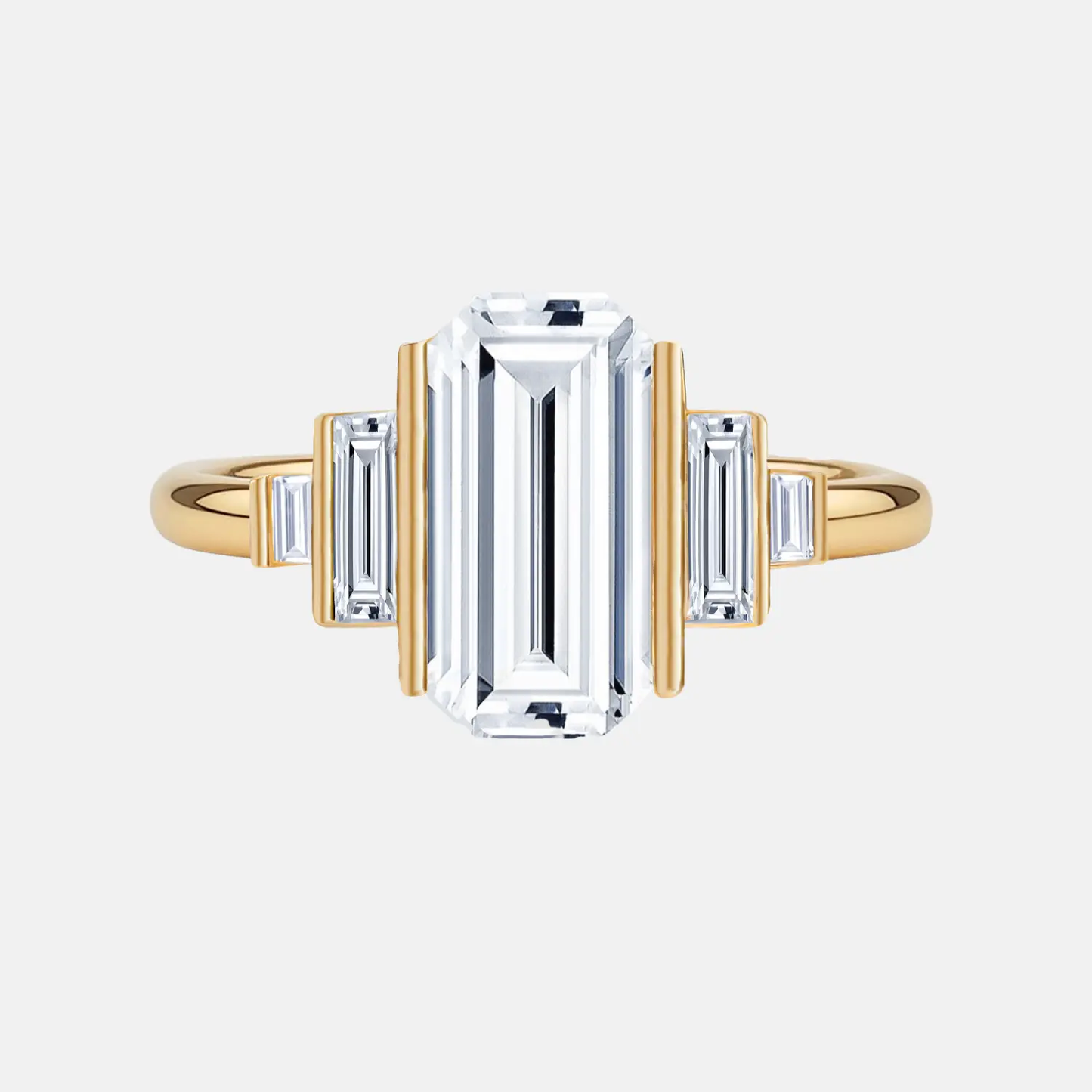 elaraine emerald baguette step-set trilogy ring ag & co jewellery