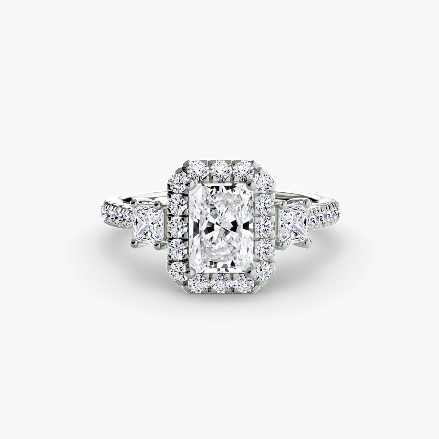 three-stone ring with halo 2 ag & co jewellery