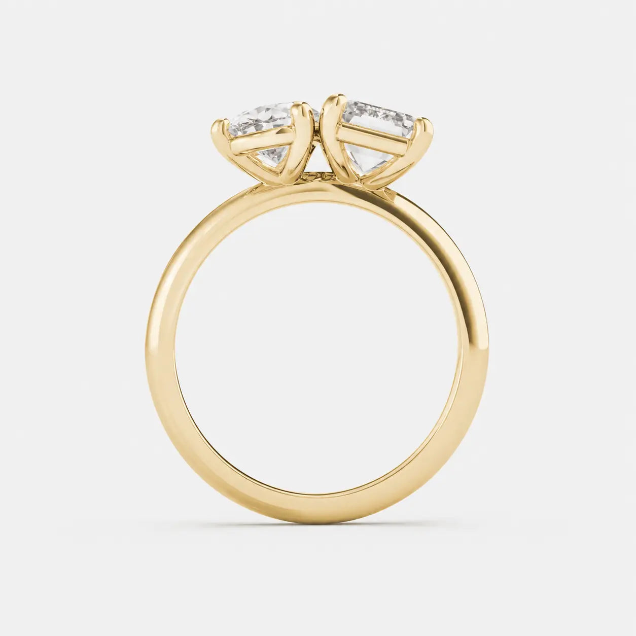 sorelle - toi et moi emerald and pear solitaire 18k engagement ring ag & co jewellery