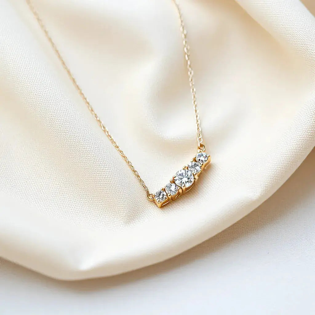 Diamond necklace with delicate chain and sparkling stones on neutral fabric background