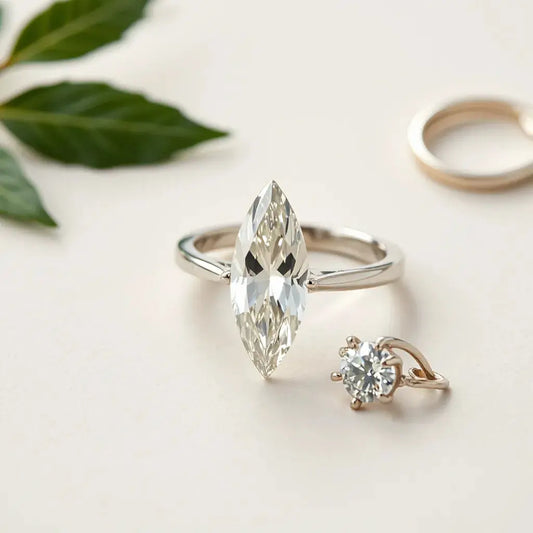 Marquise diamond ring with an elongated stone shown in soft studio light