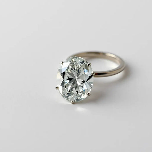 Faceted moval diamond with elongated oval shape and soft studio lighting on a neutral background
