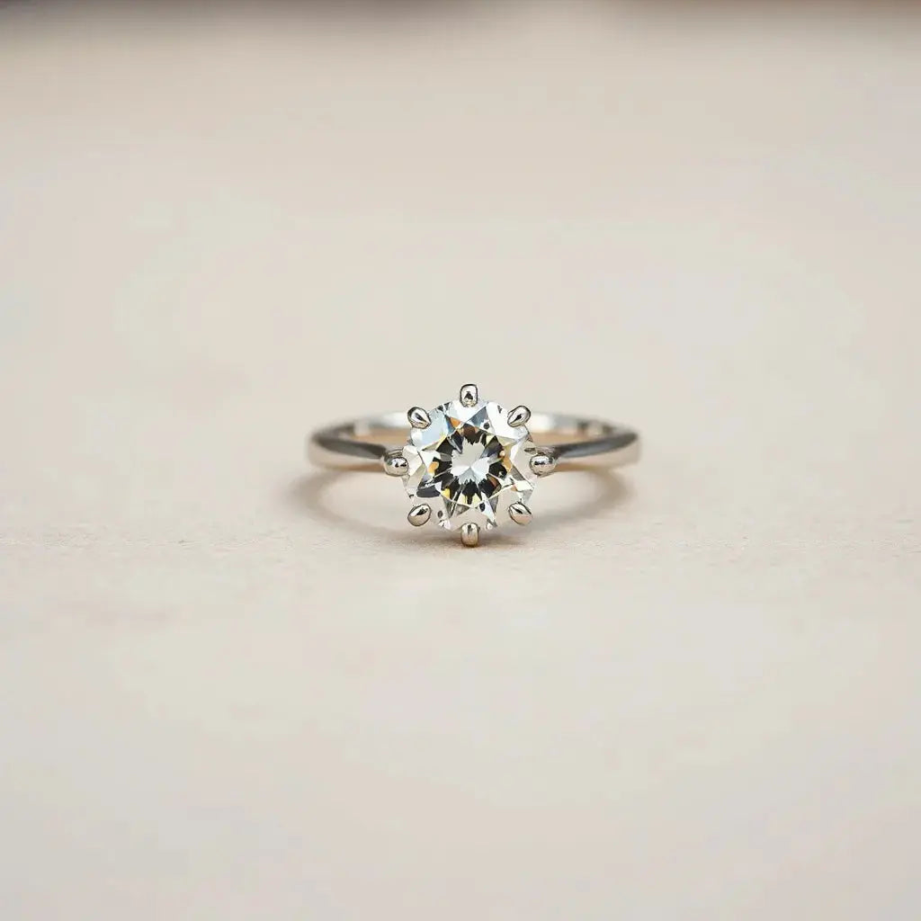 Engagement ring with a distinctive diamond setting on a neutral background with soft studio lighting