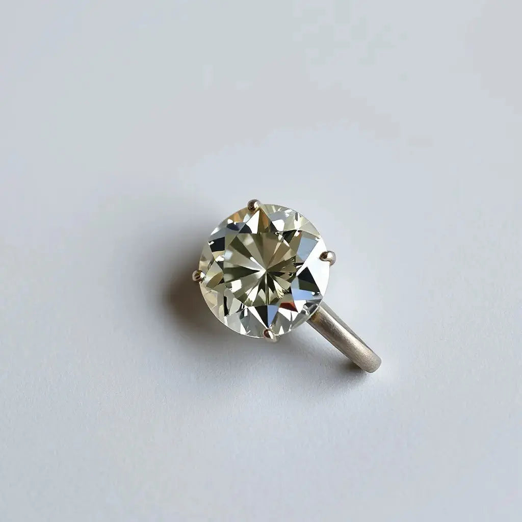 Portuguese cut natural diamond with crisp facets and soft studio lighting on a neutral background