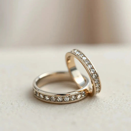 Two ring bands with a sparkling pavé stone setting in soft natural light