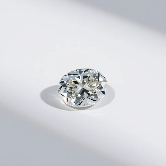 Oval Portuguese cut diamond with crisp facets and bright sparkle on a neutral background