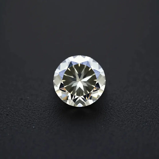F color diamond with soft sparkle on a minimalist metal band against a dark neutral background