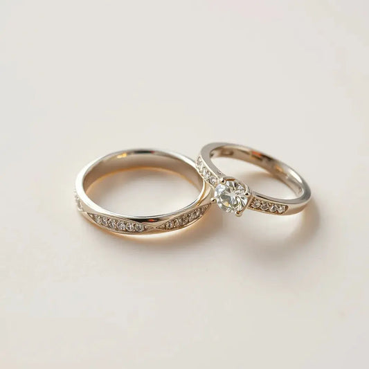 Two pavé set rings with micro-studded stones catching light on a neutral background