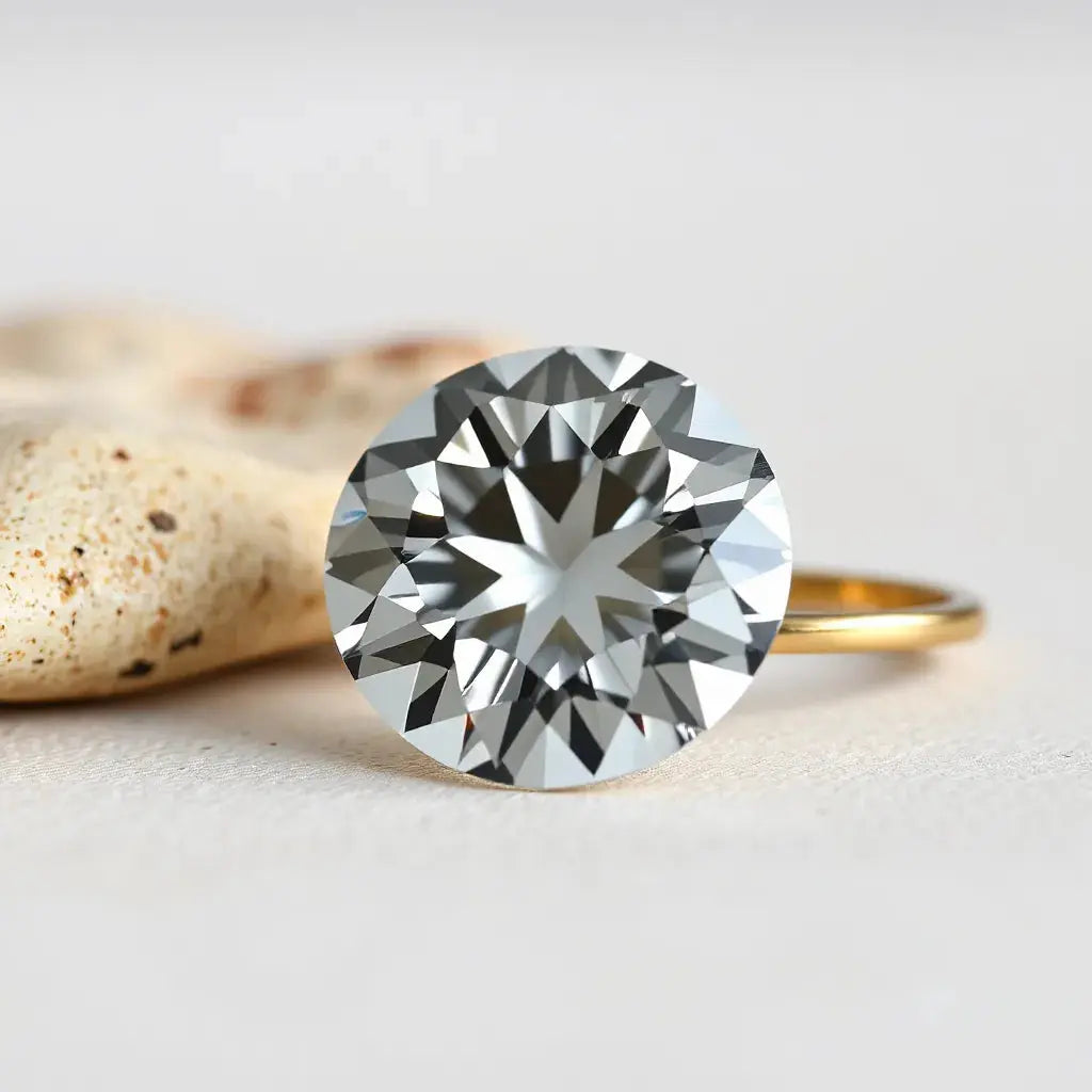 Natural Portuguese cut diamond with visible facets and soft sparkle in a minimalist jewelry setting