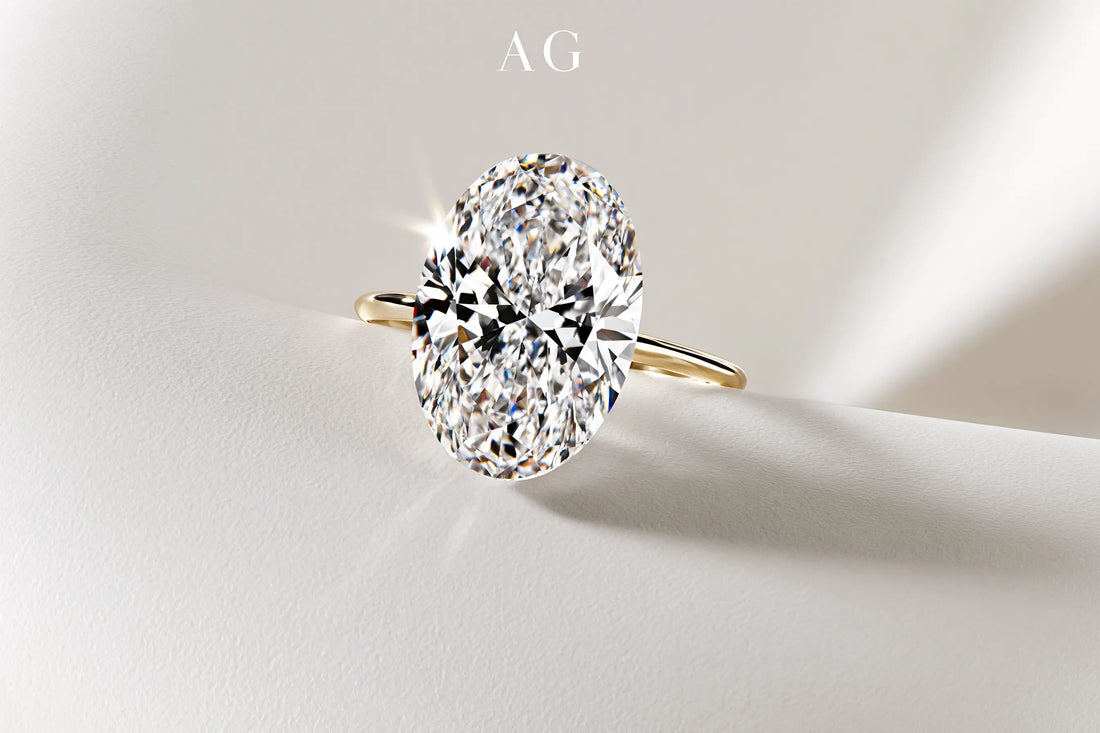 Oval Portuguese-cut diamond with crisp facets and soft studio reflections on a neutral background.
