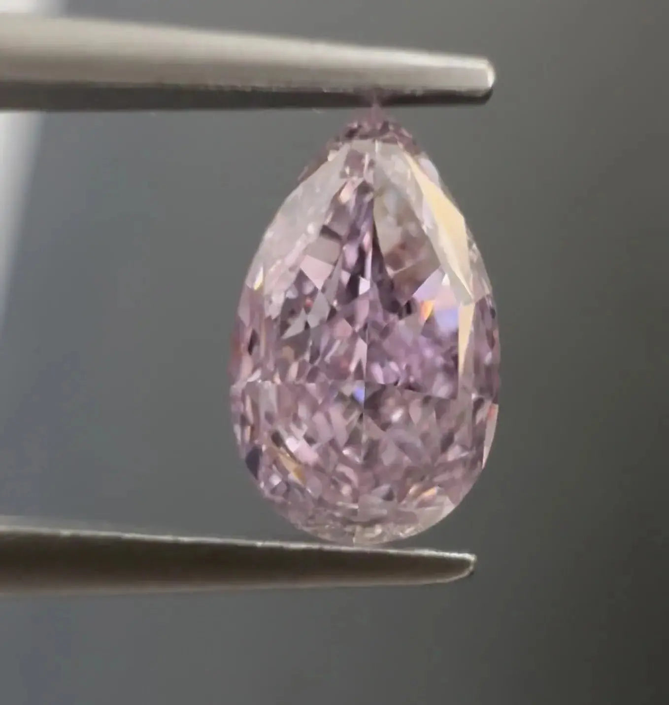 0.52ct pear natural diamond (colour fancy intense purple pink, clarity vs2, cut gd, gia certified)
