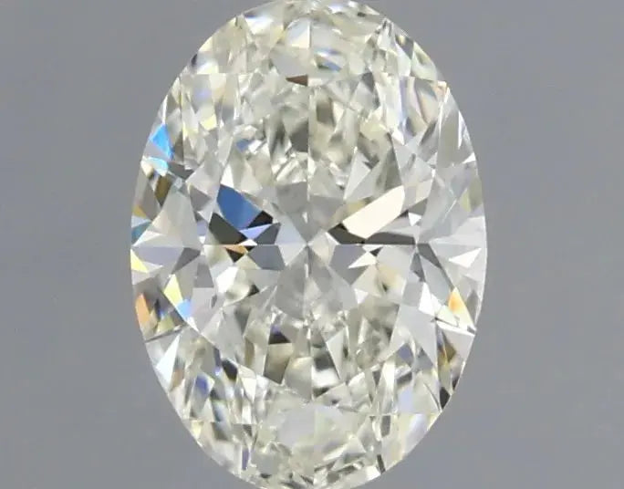 0.55ct Oval Natural Diamond (Colour J, Clarity VS1, Cut VG, IGI Certified)