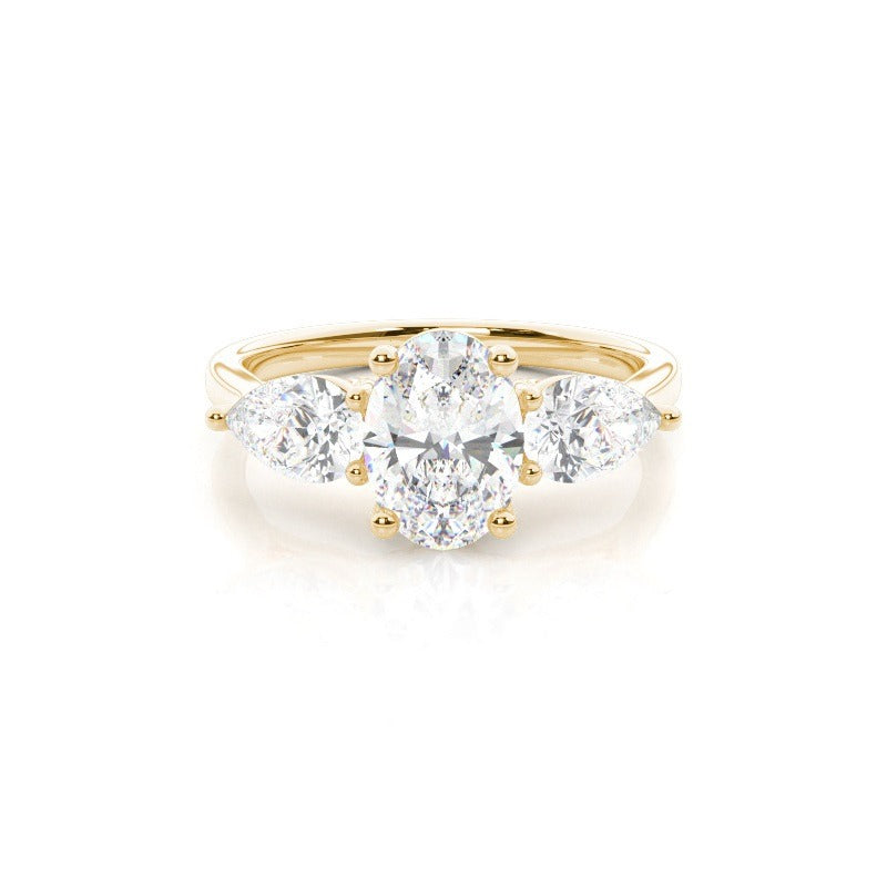 angelina prong setting oval and pear trilogy diamond engagement ring