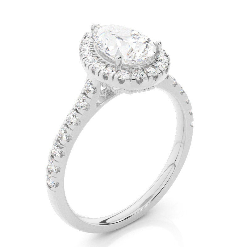 halo setting pear lab-grown diamond engagement ring with pavé band