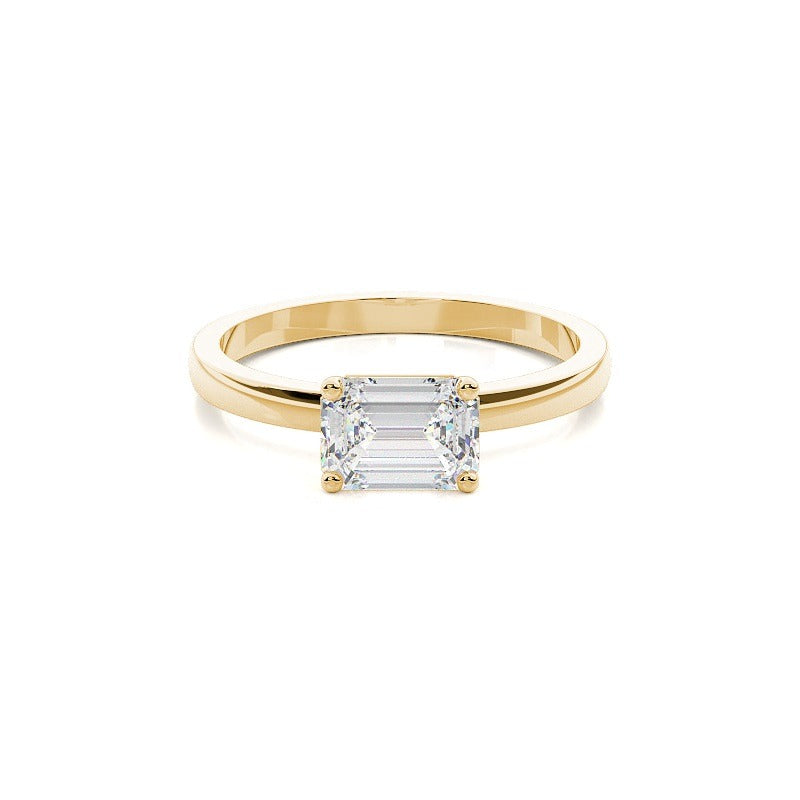 harriet - east west emerald solitaire engagement ring yellow gold - ag & co jewellery