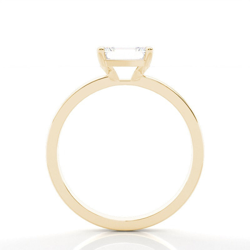 harriet - east west emerald solitaire engagement ring yellow gold - ag & co jewellery