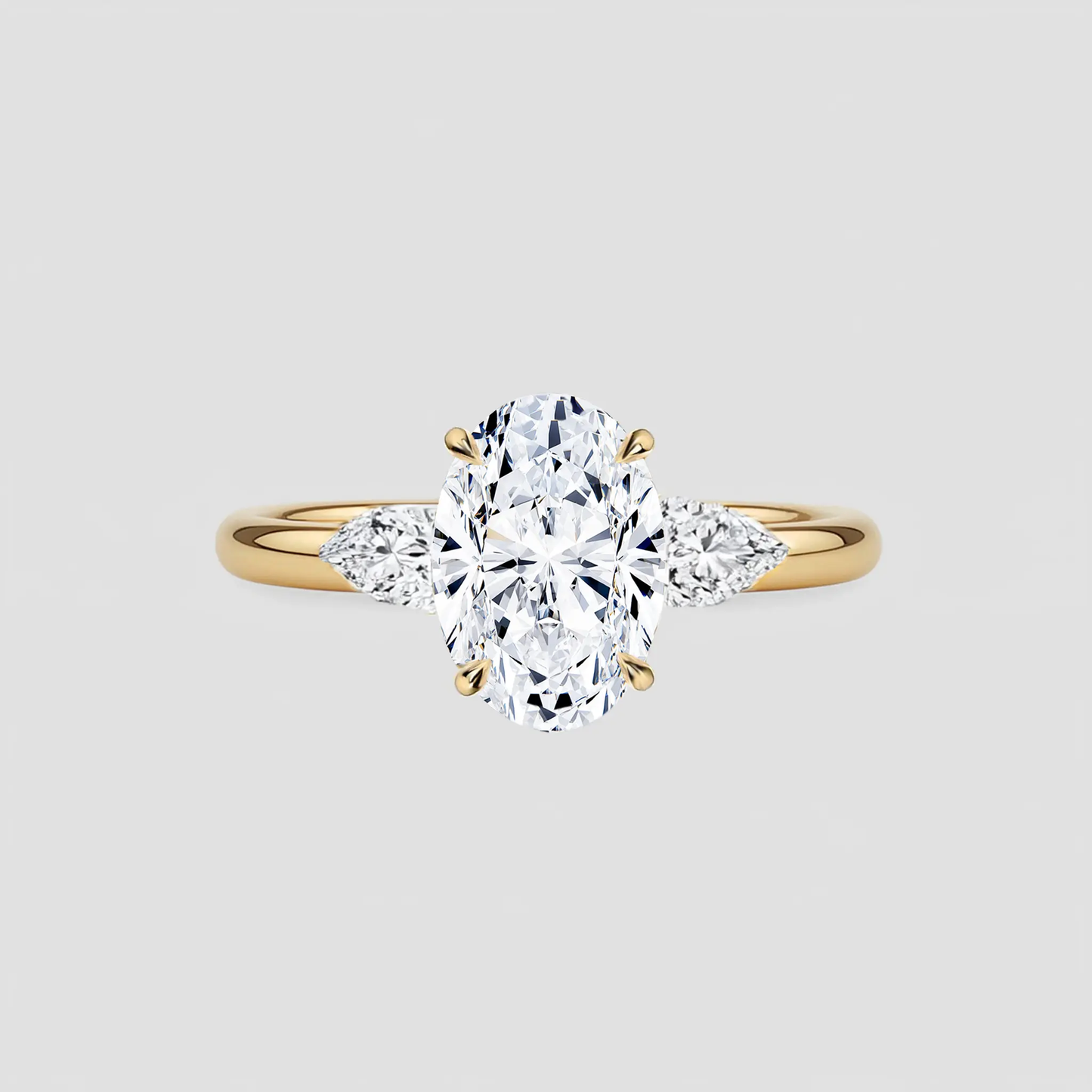 aveline - oval-cut with pear side stones ag & co jewellery