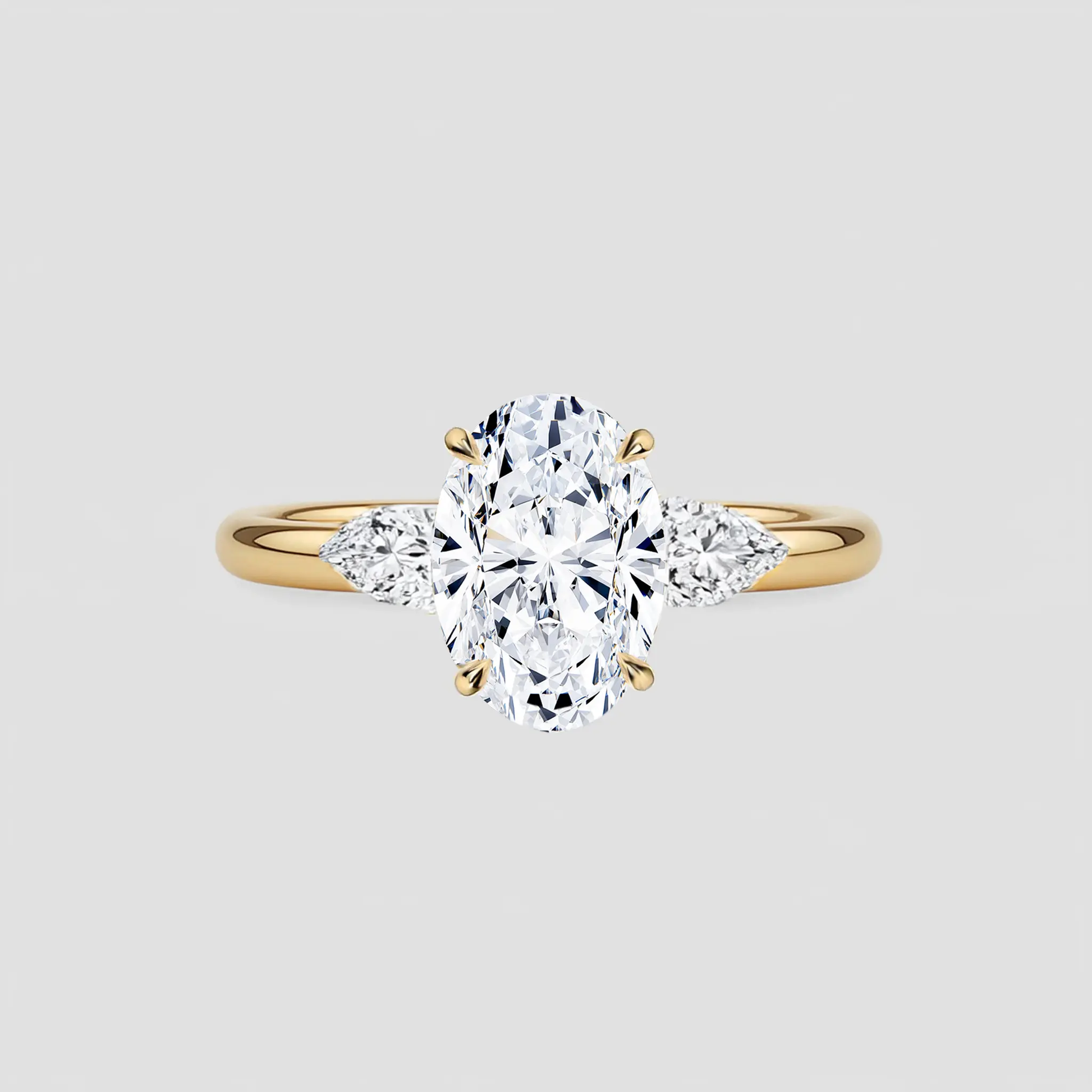 AVELINE - Oval-Cut with Pear Side Stones AG & CO Jewellery