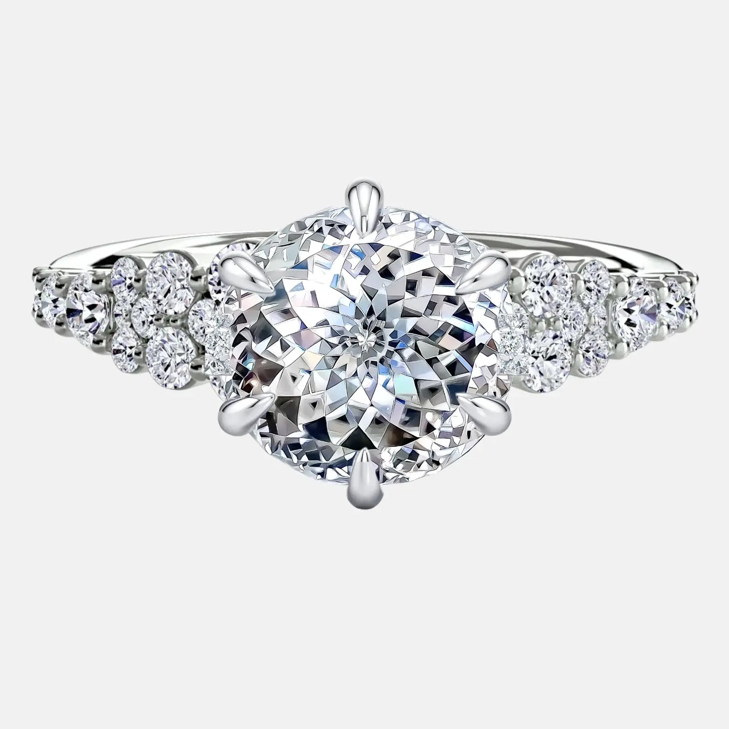 cluster engagement ring with portuguese cut diamond & round brilliant side diamonds ag & co jewellery