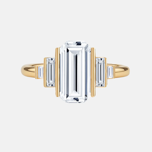 ELARAINE emerald baguette step-set trilogy ring AG & CO Jewellery