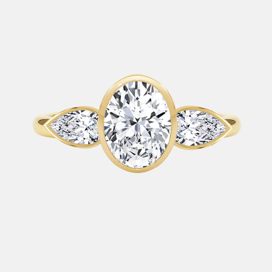 ÉLODIE oval & pear trilogy bezel ring AG & CO Jewellery