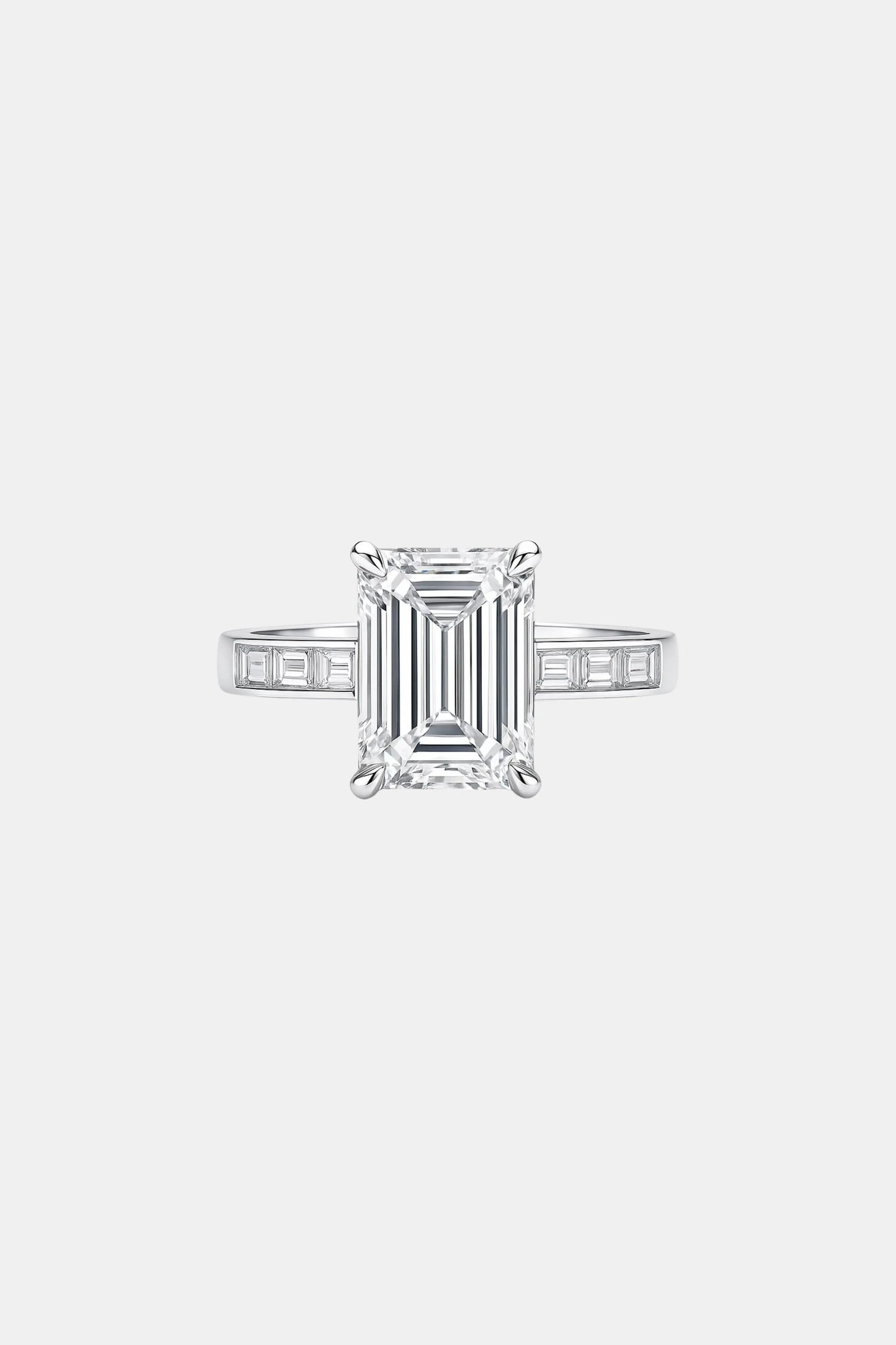 penelope - solitaire with emerald channel band ag & co jewellery