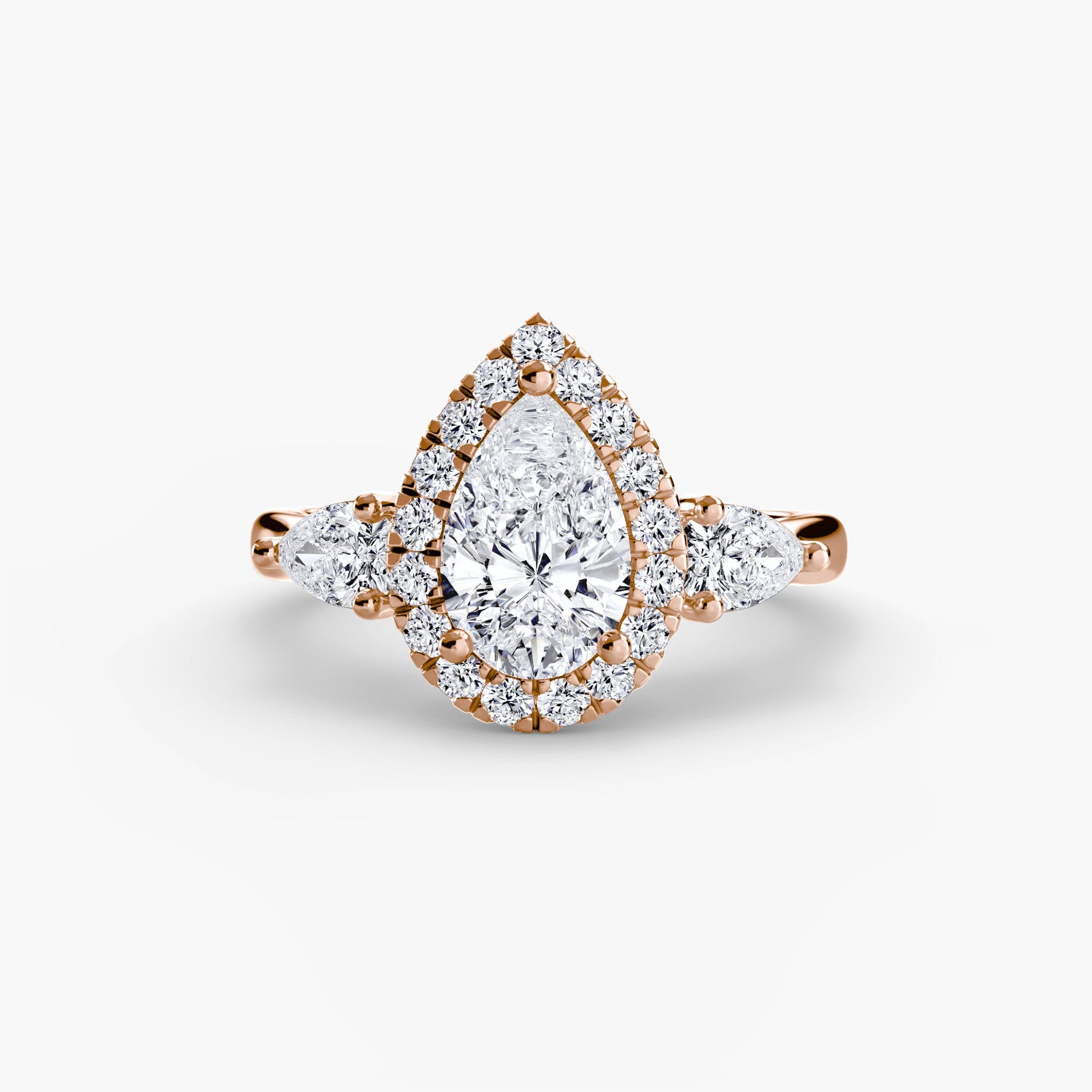 Three-Stone Ring with Halo AG & CO Jewellery