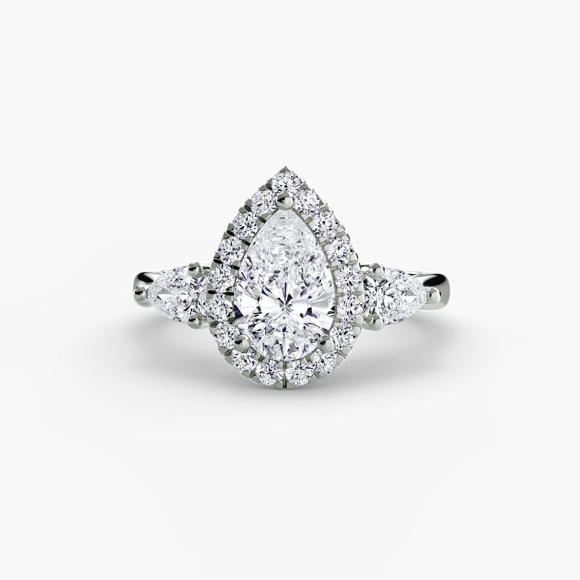 Three-Stone Ring with Halo AG & CO Jewellery