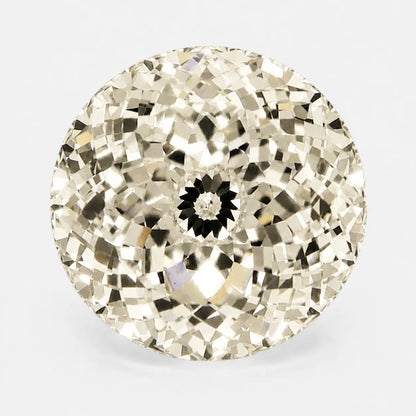 Round Portuguese diamond in a soft light yellow tone