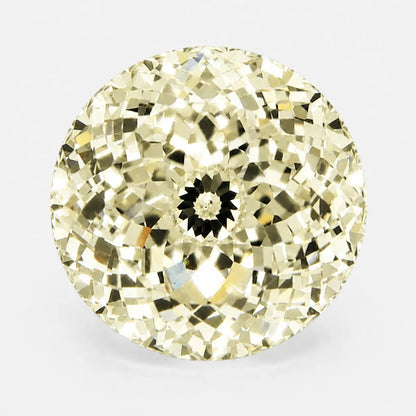 Round Portuguese diamond in a light yellow tone
