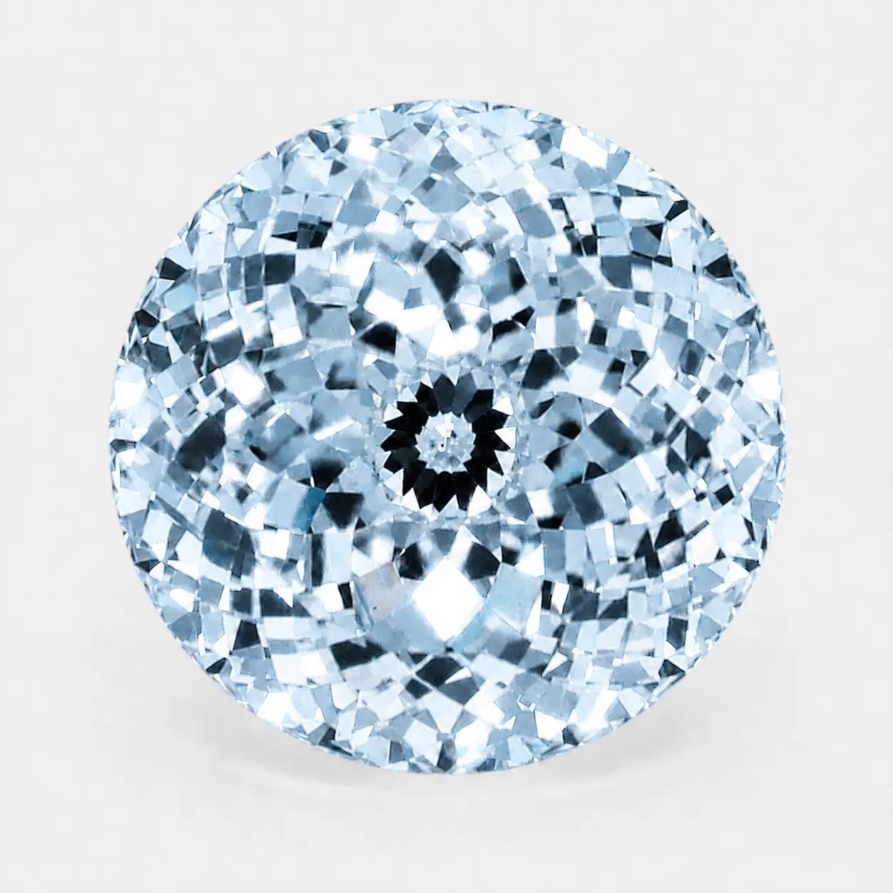 Round Portuguese diamond in an icy blue tone