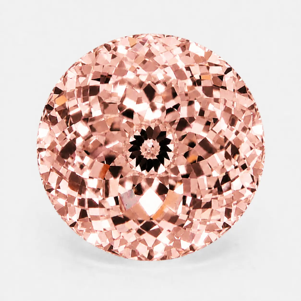 Round Portuguese diamond in a rose pink tone