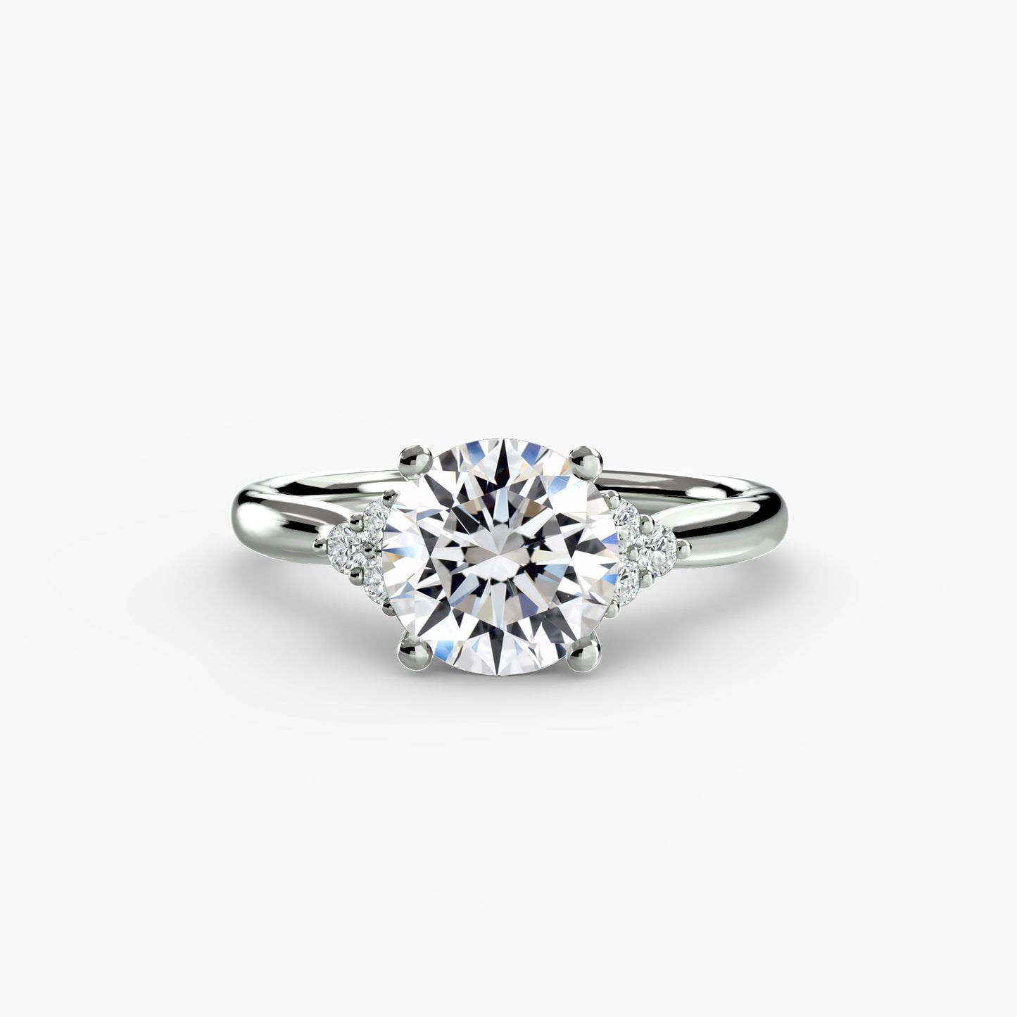 solitaire with cluster shoulders ag & co jewellery