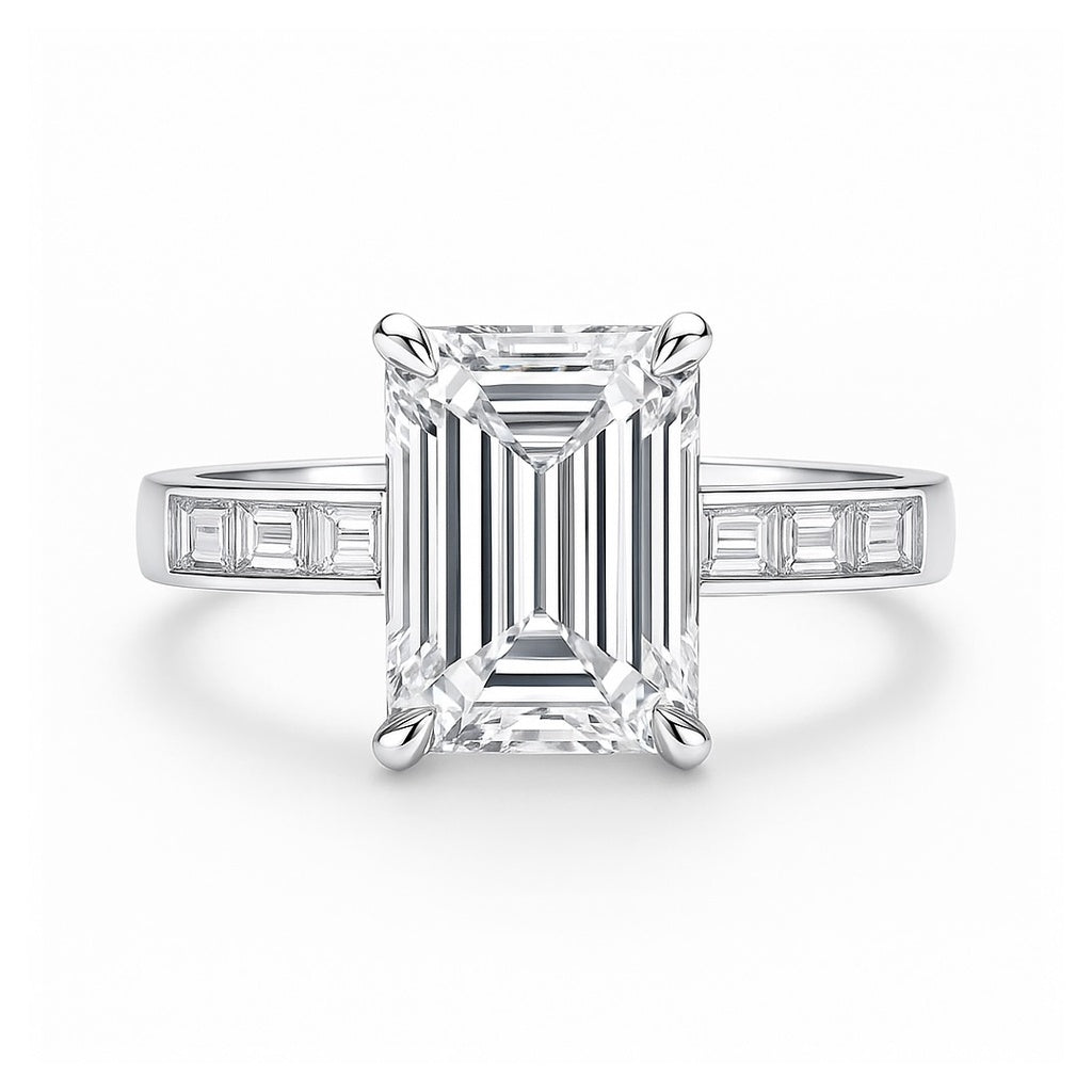 Vivienne - striking emerald solitaire paired with sleek baguette shoulders AG & CO Jewellery